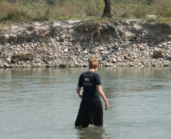 Fully clothed in strategic black for swimming in the Ganga. 