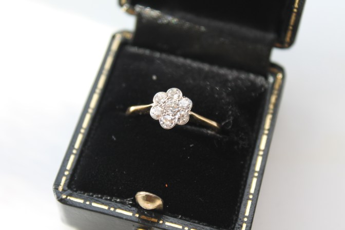 1920s antique ring, with old mine cut diamonds.