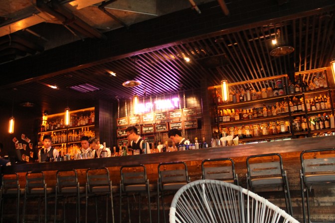 The bar, with bartenders. 