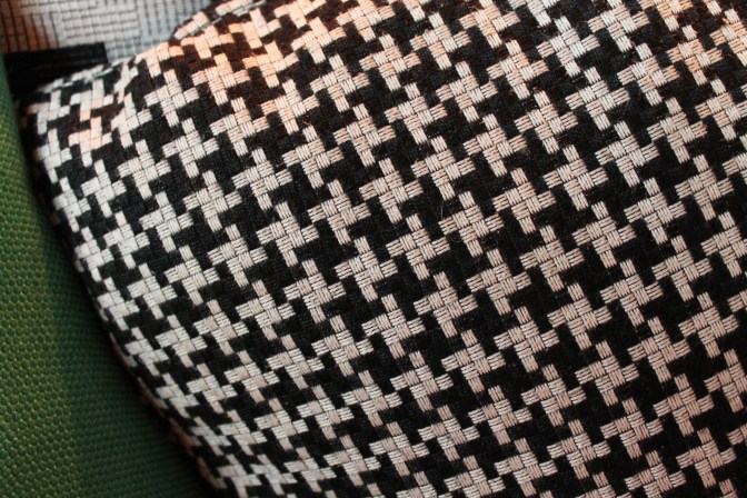 A throw pillow in the drinks lounge